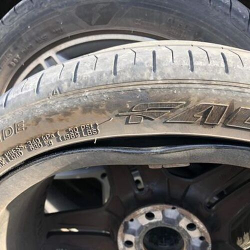 Badly buckled rim after hitting a pothole.